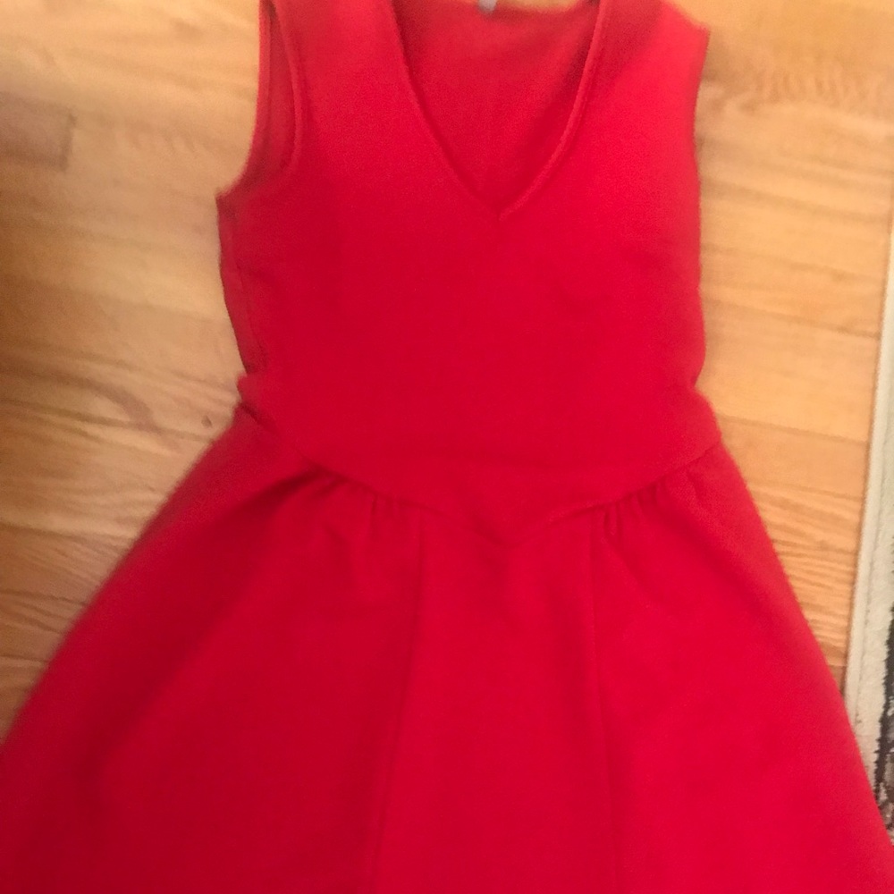 Red strechy dress size Xs but fits M as new